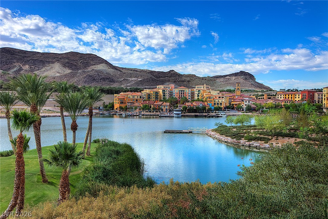 25 Falling Ridge Lane Henderson, NV 89011 - Photo 45 of 48 A picturesque waterfront community, cradled by mountains, offers serene lakeside living.