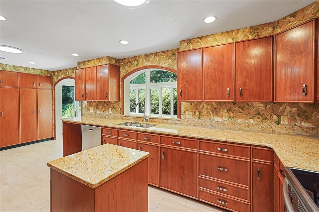 165 Barre Paxton Road Rutland, MA 01543 - Photo 13 of 42 a kitchen with stainless steel appliances granite countertop wooden cabinets a sink and dishwasher