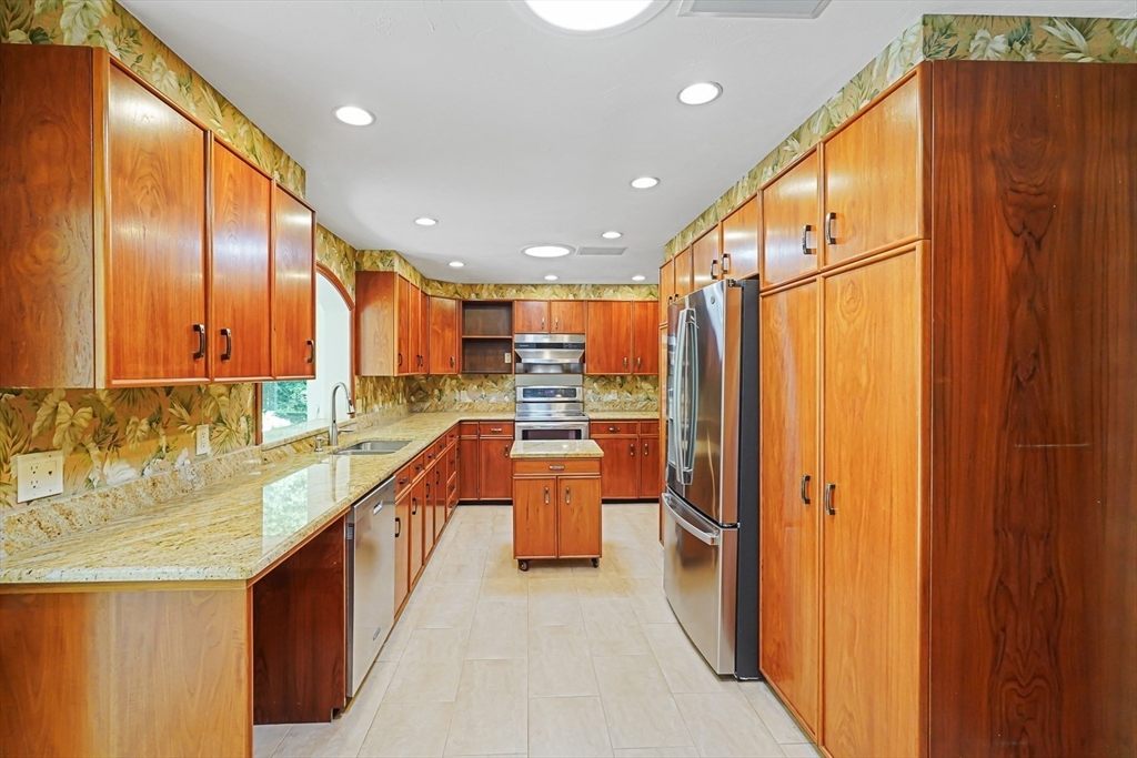165 Barre Paxton Road Rutland, MA 01543 - Photo 17 of 42 a large kitchen with stainless steel appliances granite countertop a lot of counter space and a large window