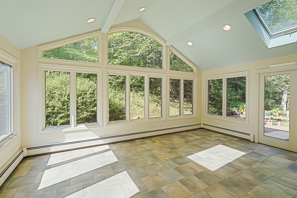 165 Barre Paxton Road Rutland, MA 01543 - Photo 20 of 42 a view of an entryway with a floor to ceiling window and a living room