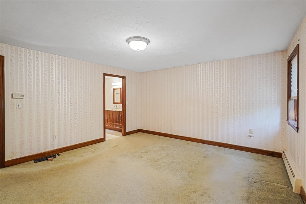 165 Barre Paxton Road Rutland, MA 01543 - Photo 29 of 42 an empty room with windows