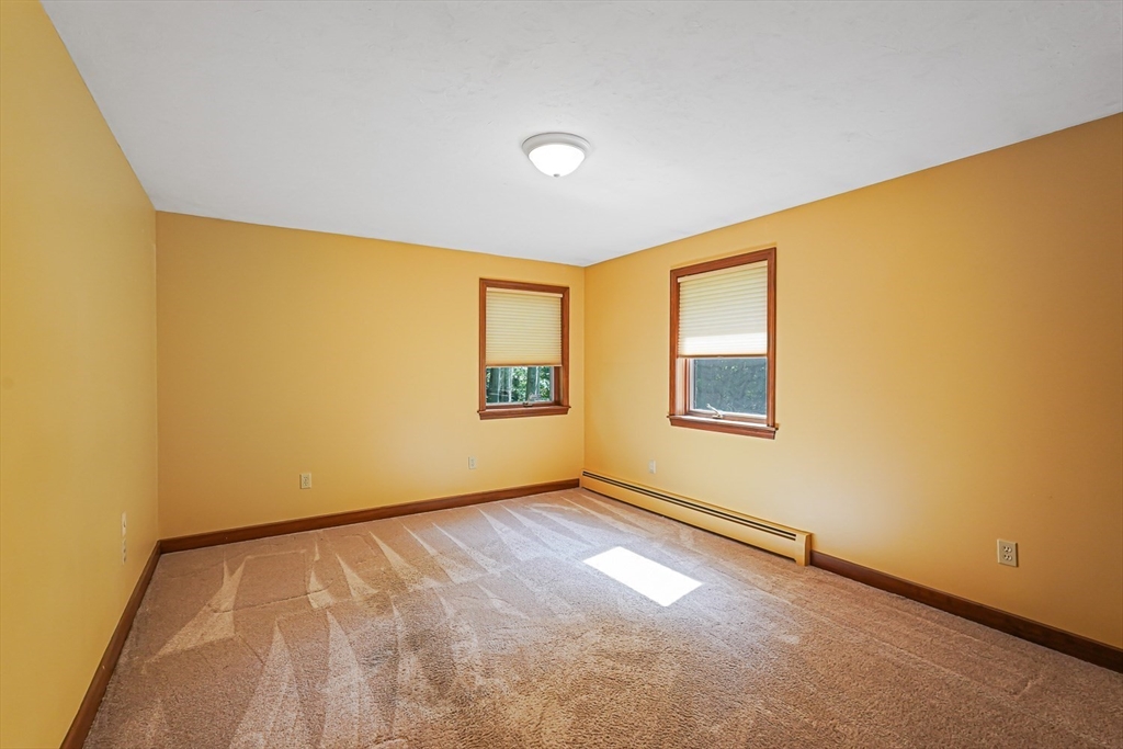 165 Barre Paxton Road Rutland, MA 01543 - Photo 33 of 42 a view of an empty room with a window