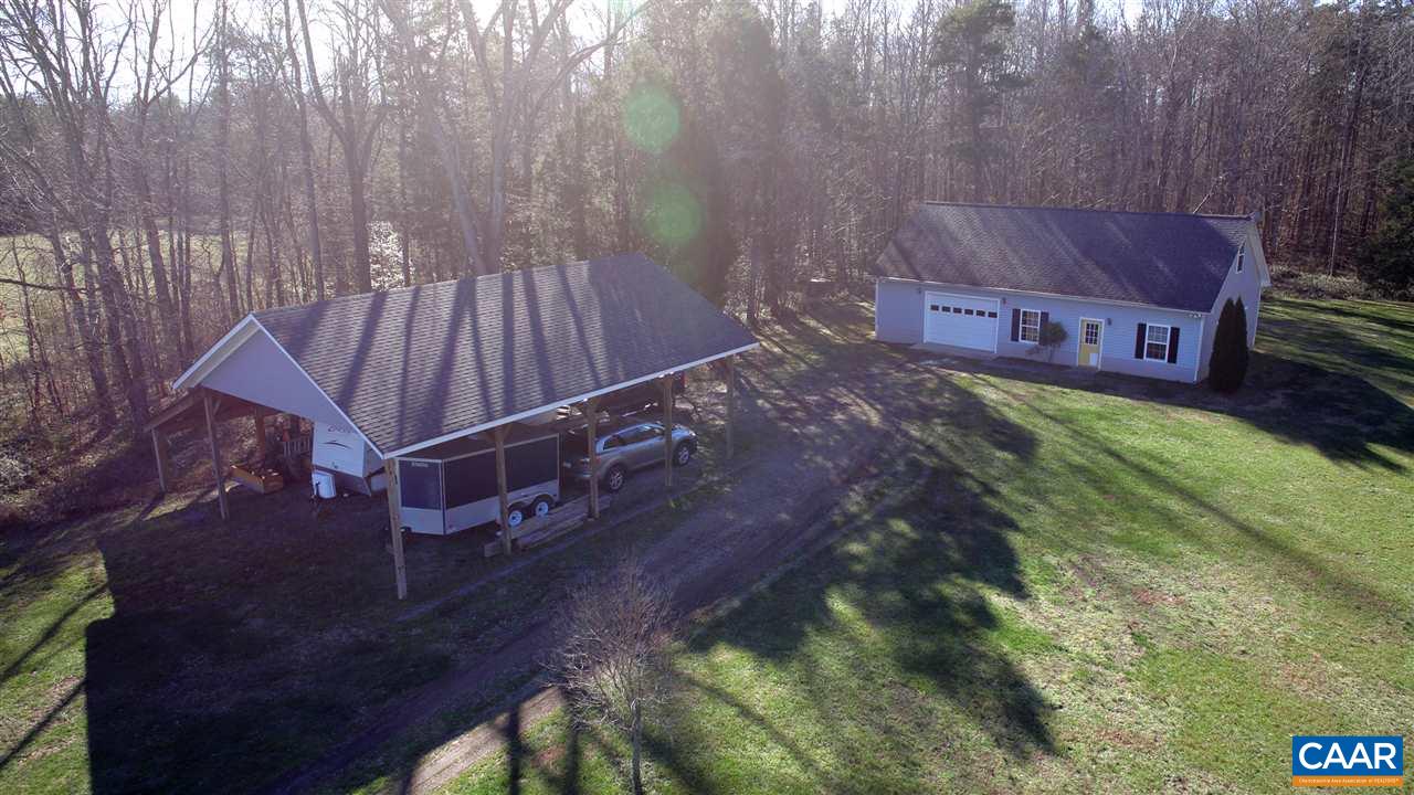5342 Duval Road Kents Store, VA 23084 - Photo 13 of 40 a view of a backyard with sitting area