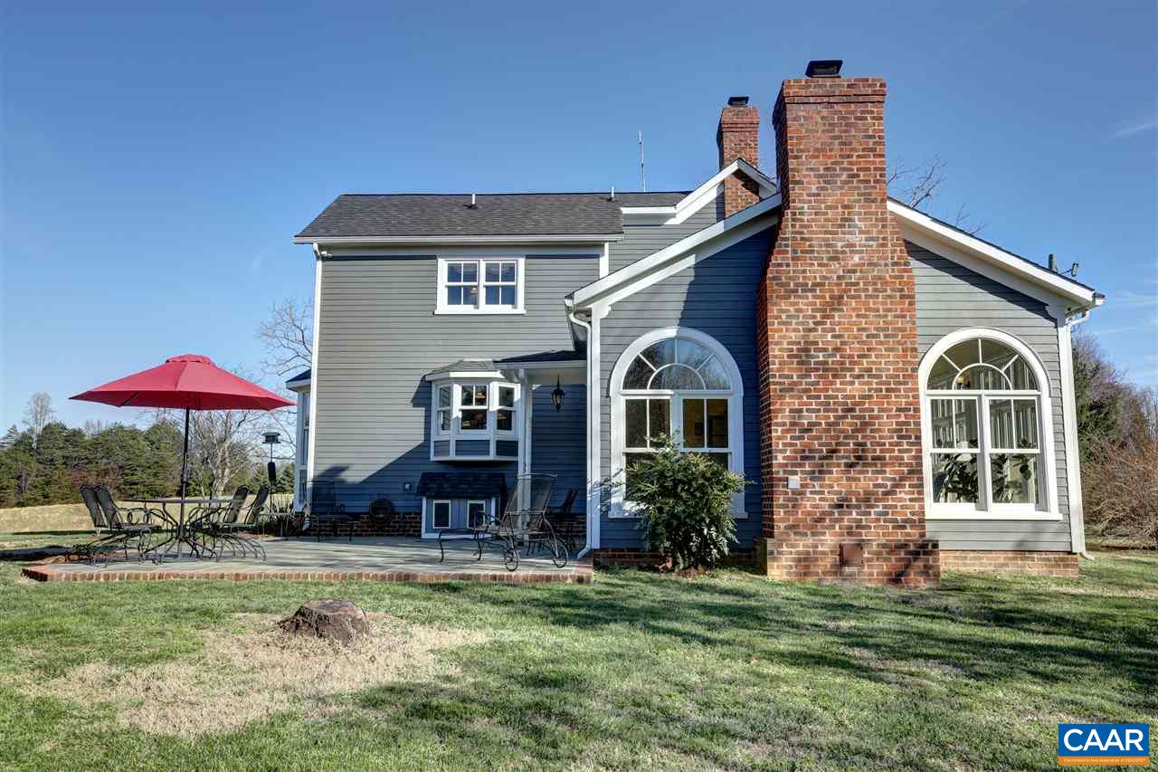 5342 Duval Road Kents Store, VA 23084 - Photo 4 of 40 a front view of a house with a yard