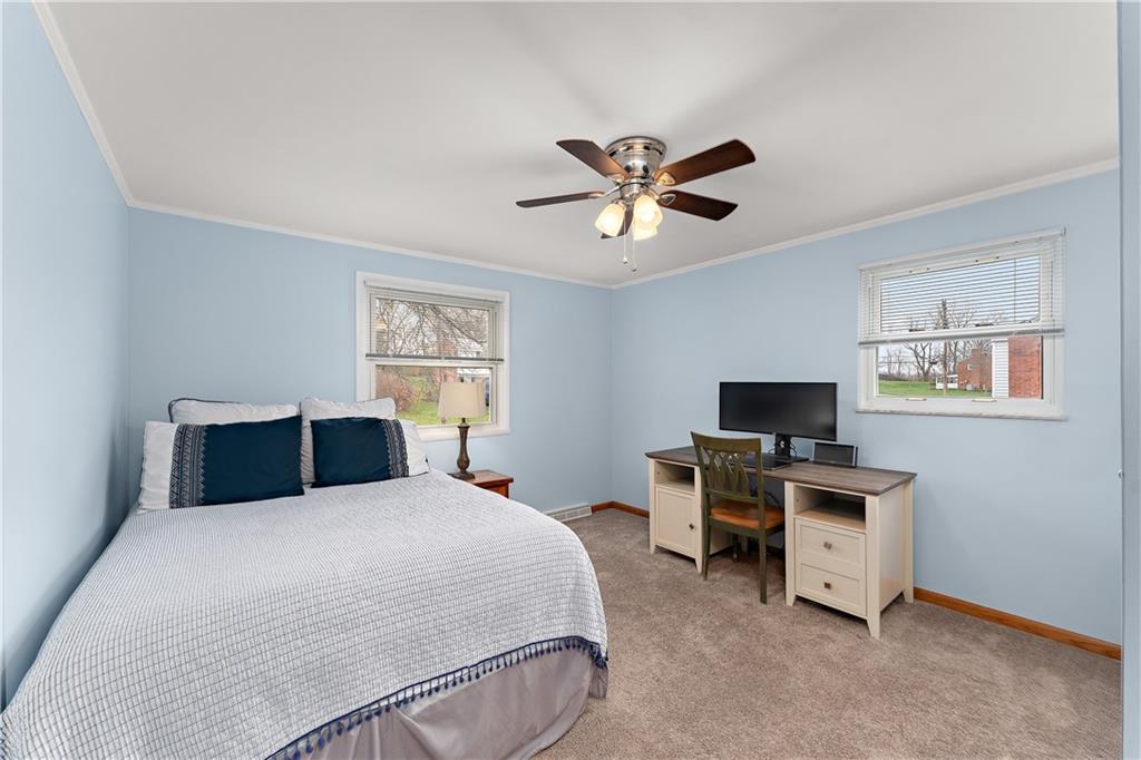 8502 Ridgemont Road Pittsburgh, PA 15237 - Photo 26 of 40 The second bedroom is a great size and includes a ceiling fan.