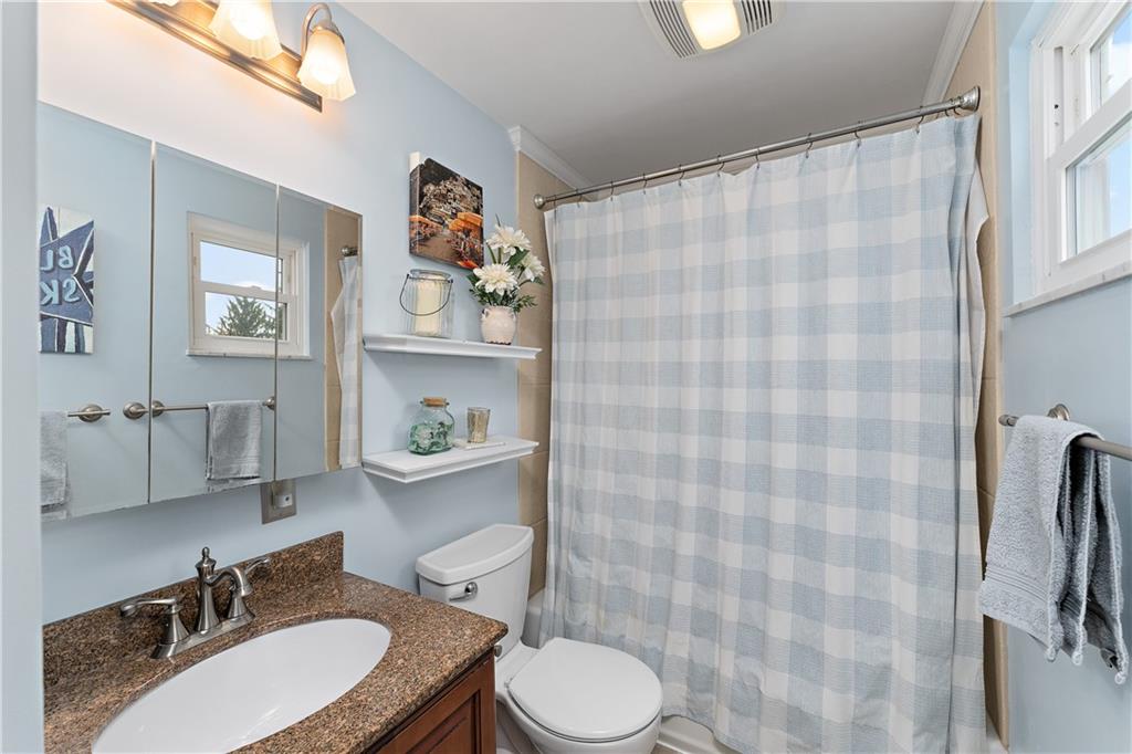 8502 Ridgemont Road Pittsburgh, PA 15237 - Photo 29 of 40 The hall bath has a full size tub/shower and updated fixtures.