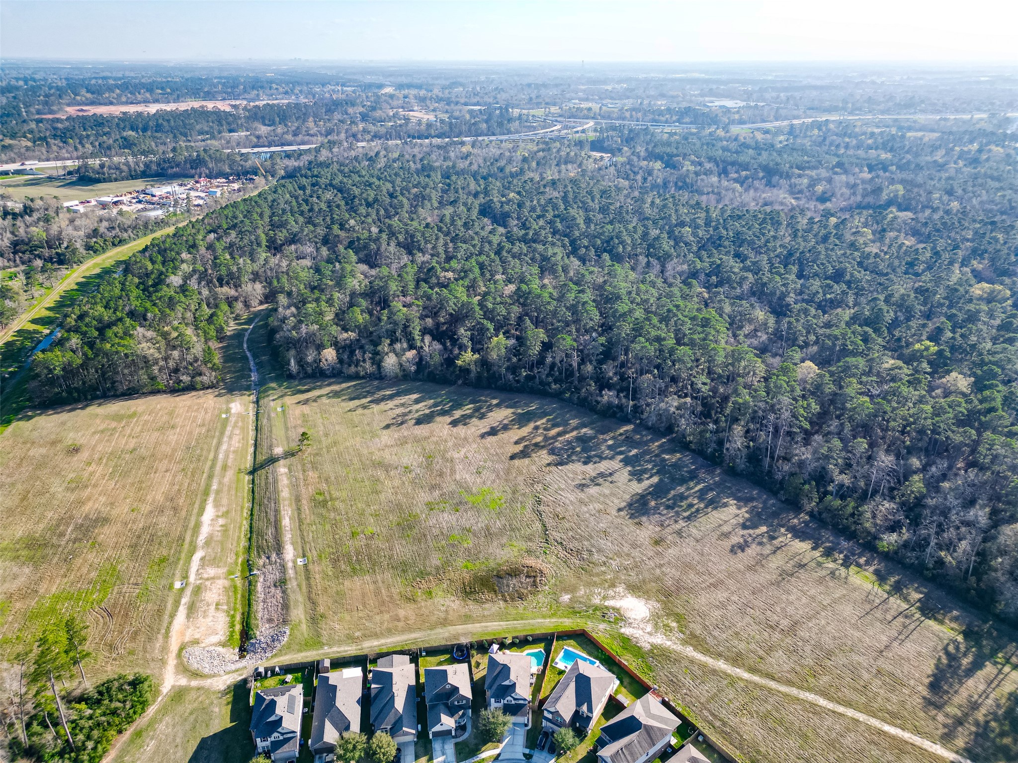 2672 Magnolia Fair Way Spring, TX 77386 - Photo 17 of 49 Aerial view - Spring Creek Greenway behind the tree line.
