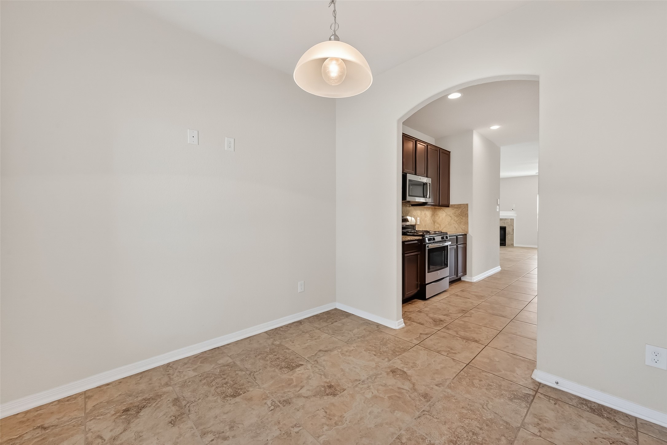 2672 Magnolia Fair Way Spring, TX 77386 - Photo 21 of 49 Cozy breakfast nook with seamless access to a modern kitchen.