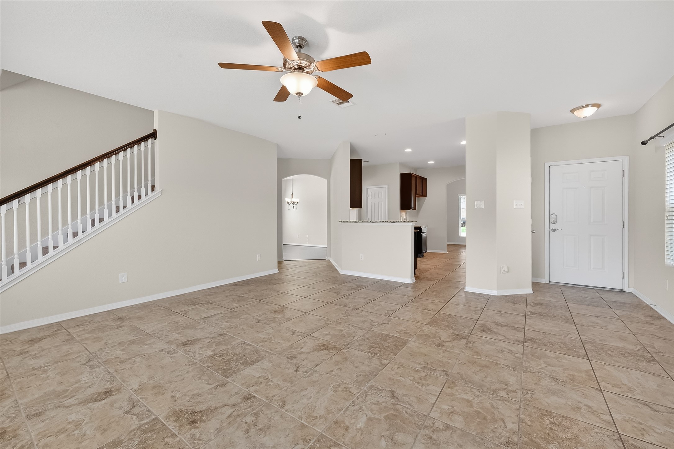 2672 Magnolia Fair Way Spring, TX 77386 - Photo 27 of 49 Living Room looking into the Kitchen and formal dining room