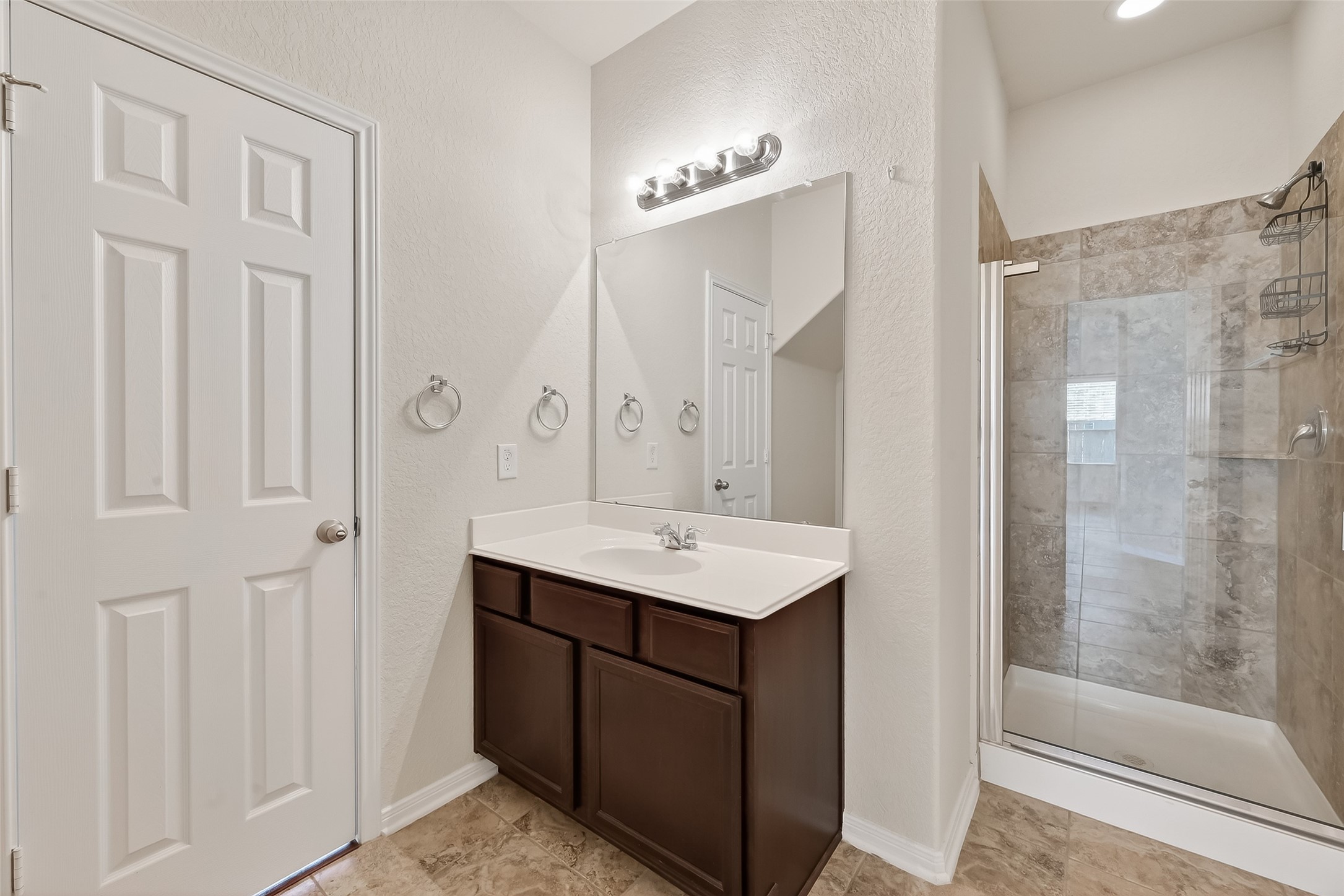 2672 Magnolia Fair Way Spring, TX 77386 - Photo 30 of 49 Convenient first-floor bathroom with modern standing shower.