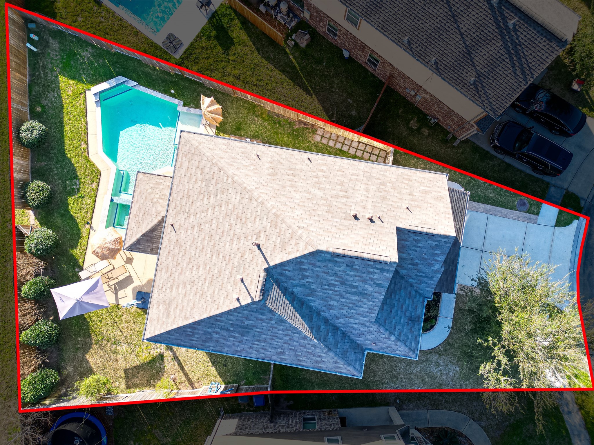 2672 Magnolia Fair Way Spring, TX 77386 - Photo 3 of 49 Spacious property with a private pool, ample backyard, and convenient driveway access, perfect for relaxation and entertaining.