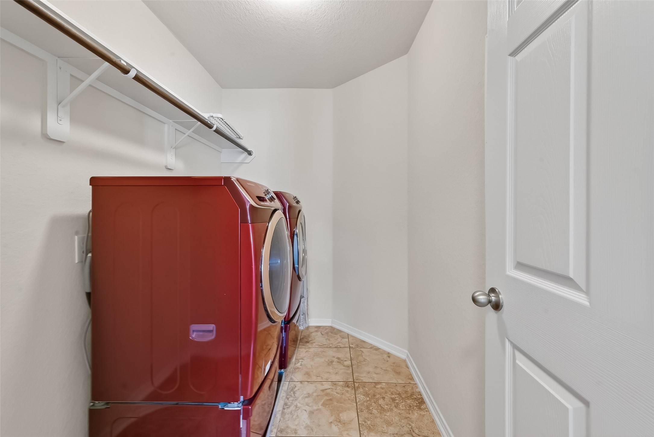 2672 Magnolia Fair Way Spring, TX 77386 - Photo 40 of 49 Efficient laundry room with included washer and dryer.