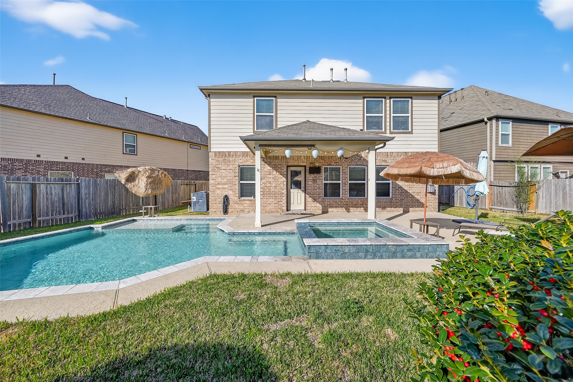 2672 Magnolia Fair Way Spring, TX 77386 - Photo 42 of 49 Alternate view of the backyard oasis, showcasing its inviting outdoor retreat.