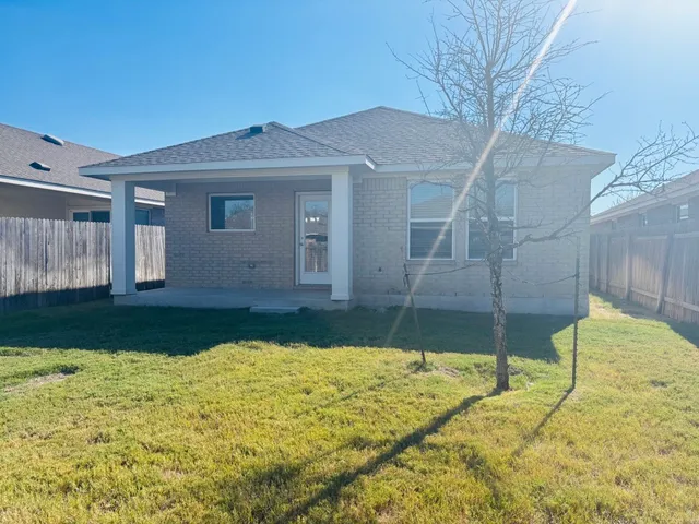 a bathroom with a tub and shower