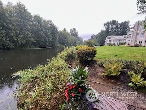 17426 Northeast Bothell Way, Unit A 107 Bothell, WA 98011 - Photo 6 of 11 a view of a garden with a lake