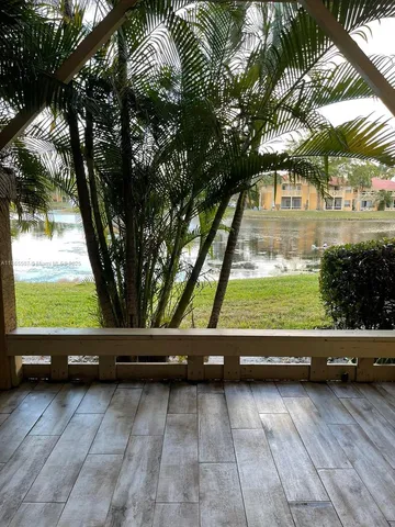 a view of backyard with green space