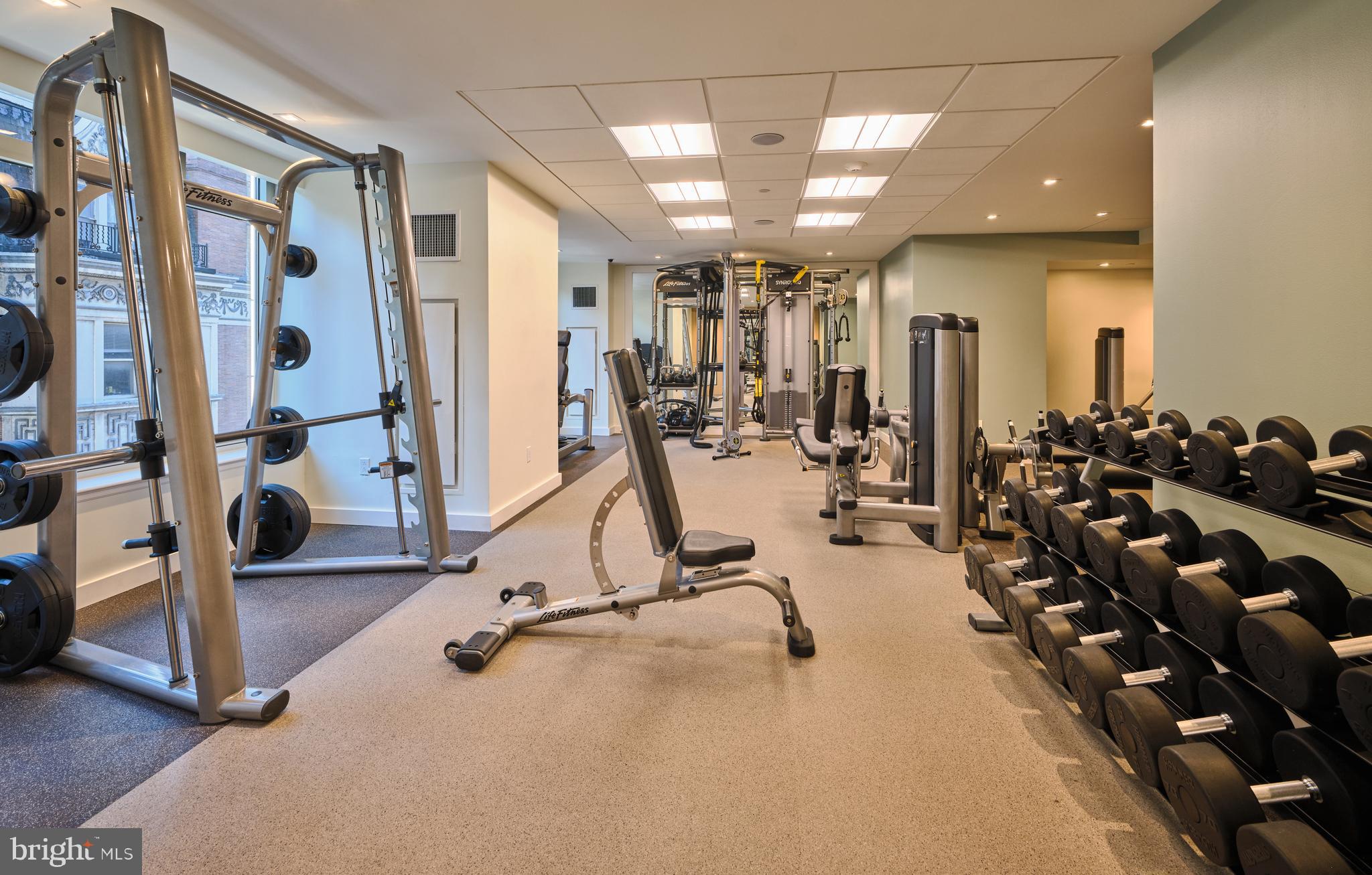 130 South 18th Street, Unit 1602 Philadelphia, PA 19103 - Photo 41 of 52 a view of a room with gym equipment