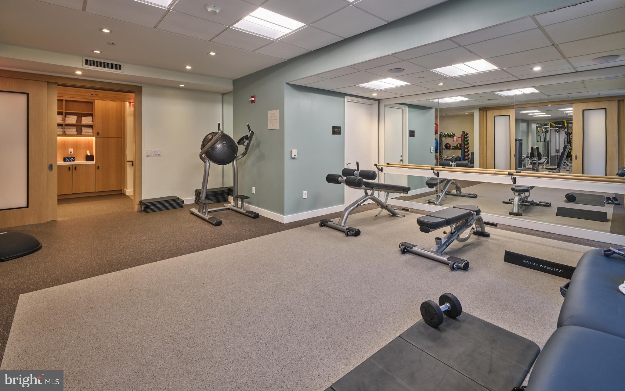 130 South 18th Street, Unit 1602 Philadelphia, PA 19103 - Photo 42 of 52 a view of a room with gym equipment