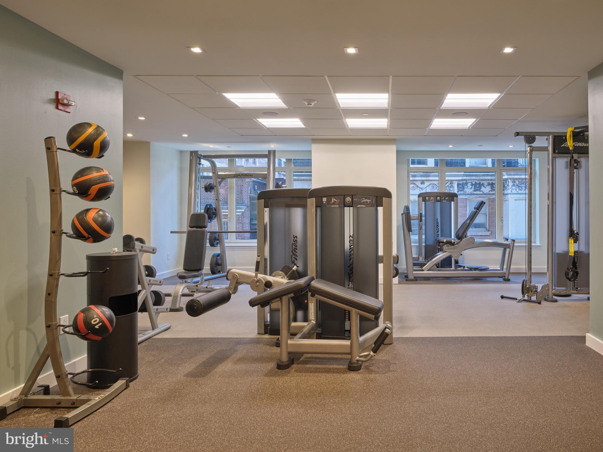 130 South 18th Street, Unit 1602 Philadelphia, PA 19103 - Photo 43 of 52 a view of a room with gym equipment