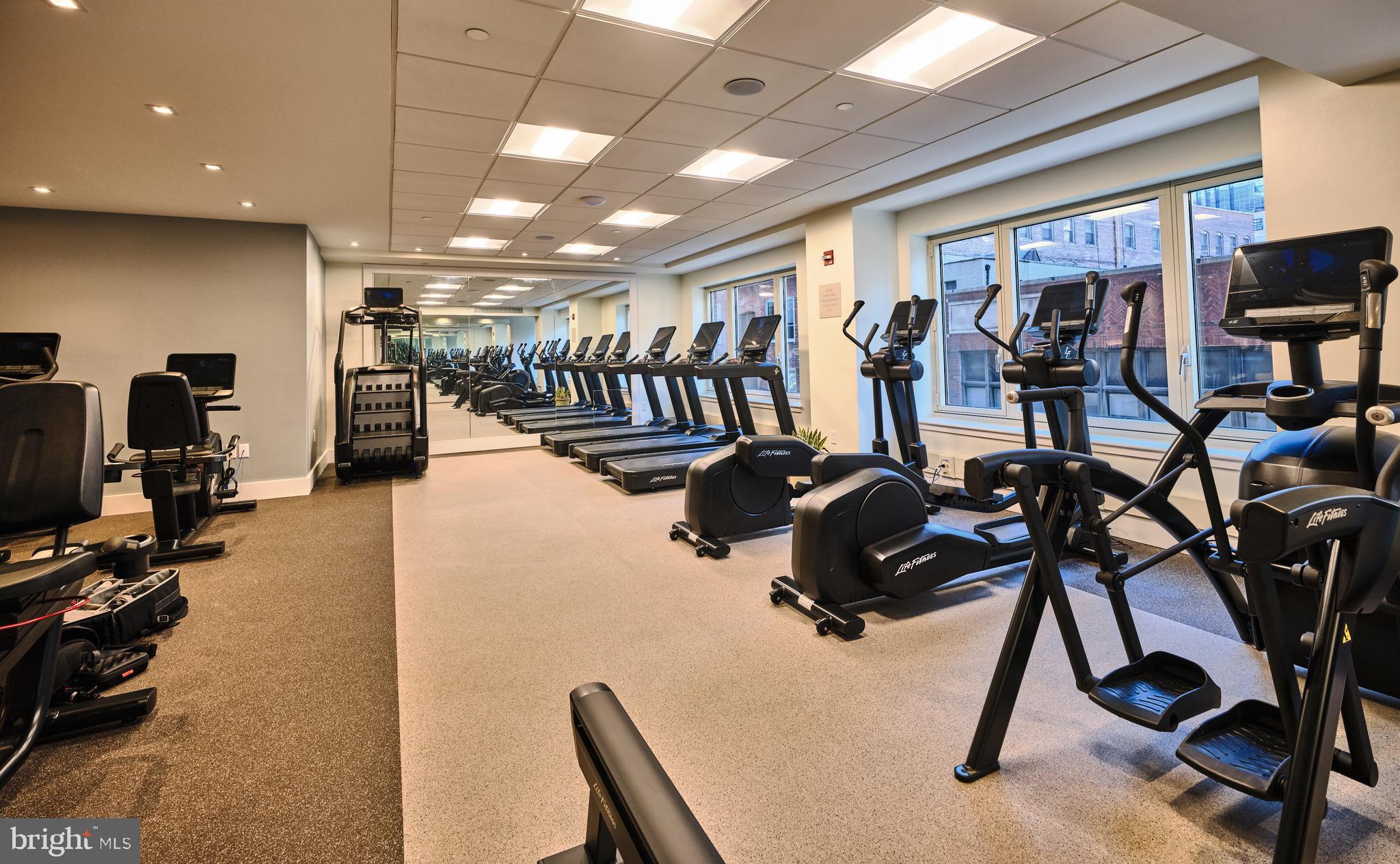 130 South 18th Street, Unit 1602 Philadelphia, PA 19103 - Photo 44 of 52 a view of a room with gym equipment