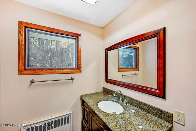 a view of a big room with wooden floor