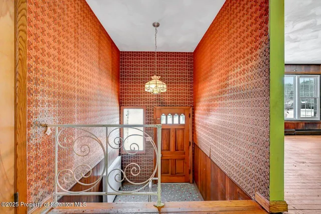 a view of a livingroom with a staircase