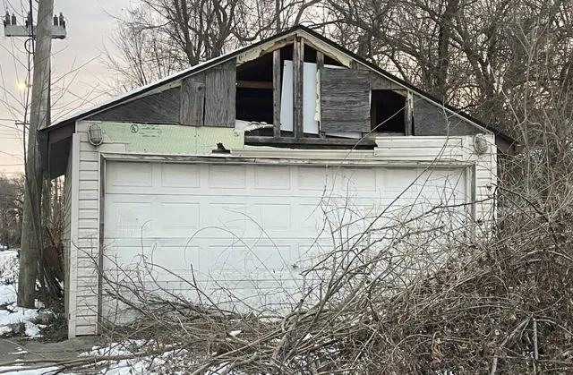 a house with trees in front of it
