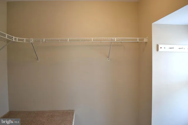 a view of a room with racks on the wall
