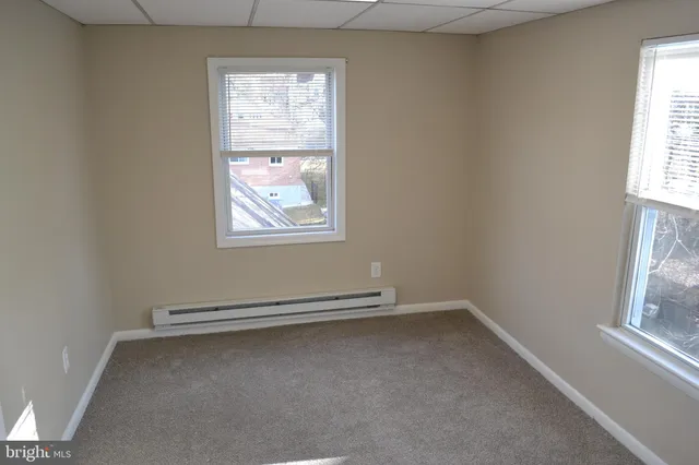 a view of livingroom with workspace