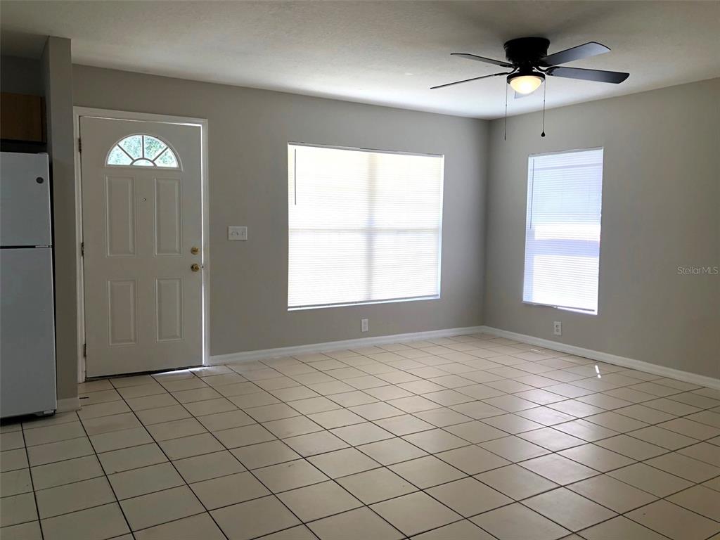 2406 South Maple Avenue Sanford, FL 32771 - Photo 2 of 12 a view of an empty room and window