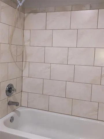 a bathroom with a bathtub