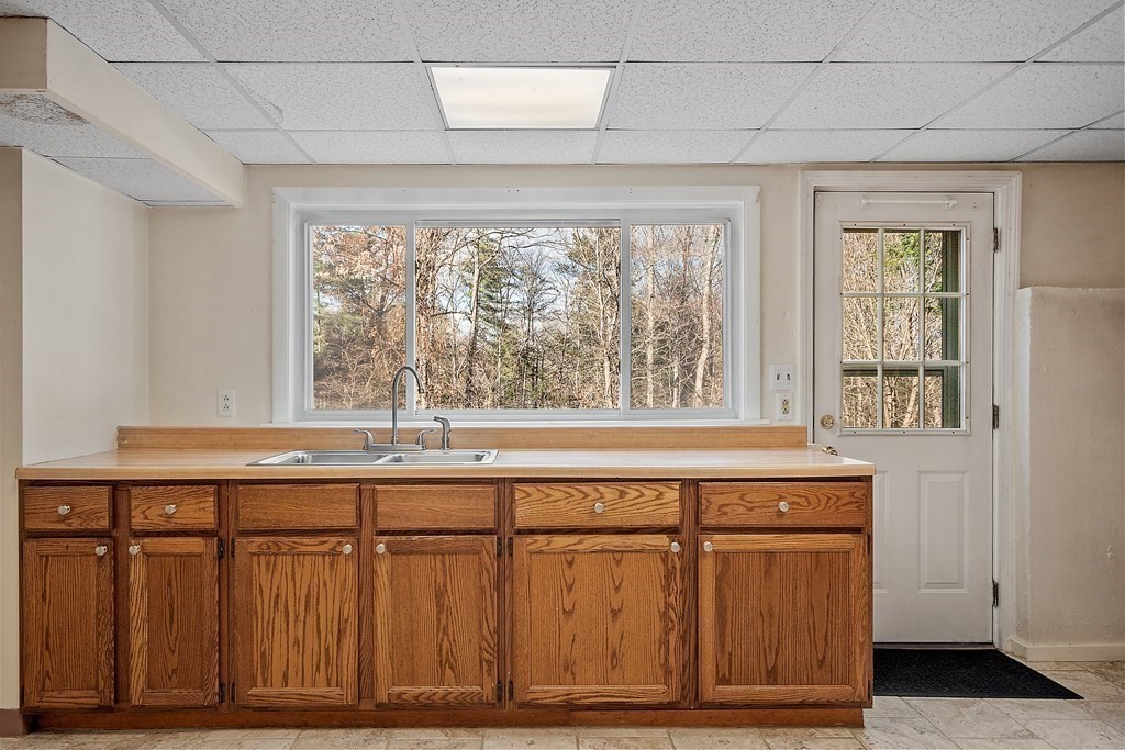 185 Sterling Road Lancaster, MA 01523 - Photo 33 of 42 a living room with furniture and a window