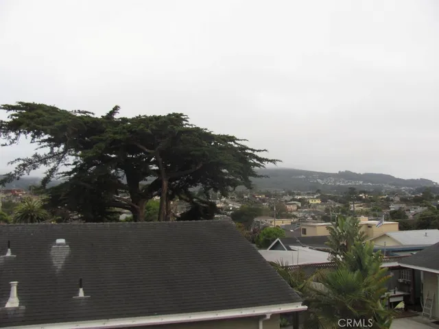 an aerial view of residential house and outdoor space