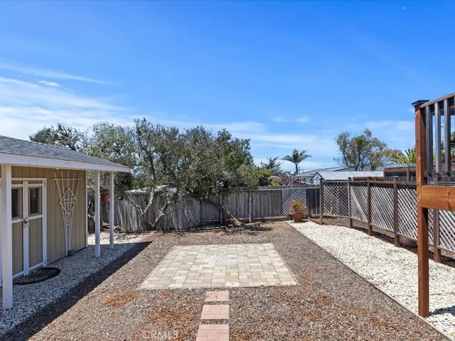 an aerial view of residential houses and outdoor space