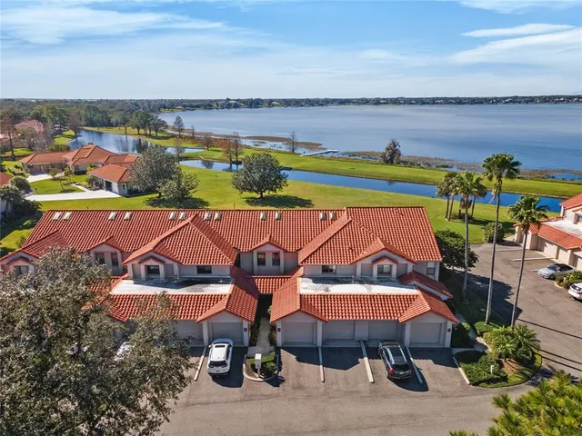 an aerial view of a house with outdoor space