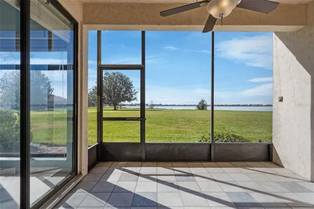 a view of a glass door with a floor to ceiling window