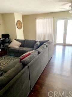 4191 St George Place Riverside, CA 92504 - Photo 1 of 1 a living room with furniture and a window
