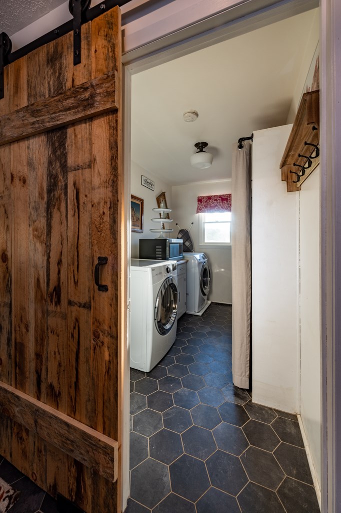 588 Pinetree Road Blue Ridge, GA 30513 - Photo 11 of 54 a utility room with cabinets