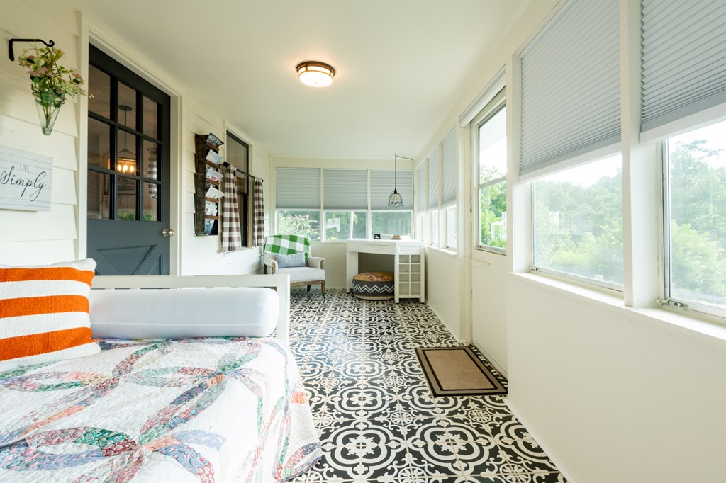 588 Pinetree Road Blue Ridge, GA 30513 - Photo 14 of 54 a living room with furniture and a table