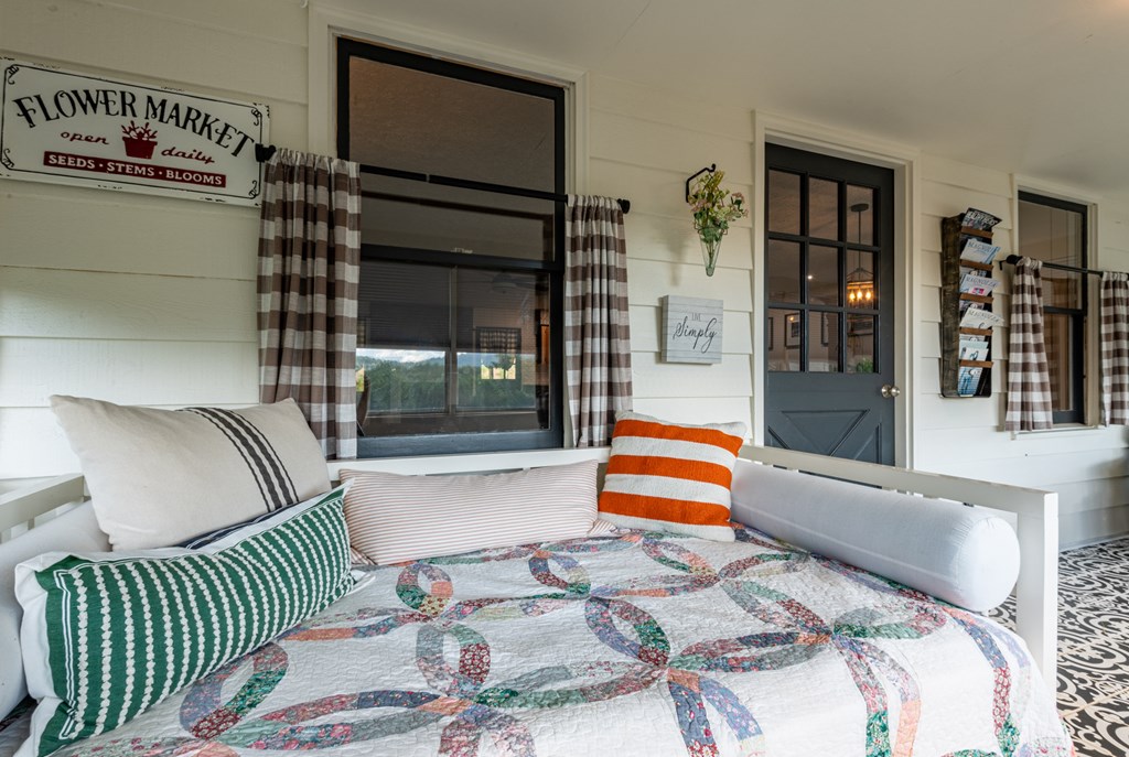 588 Pinetree Road Blue Ridge, GA 30513 - Photo 15 of 54 a bedroom with a bed and a window