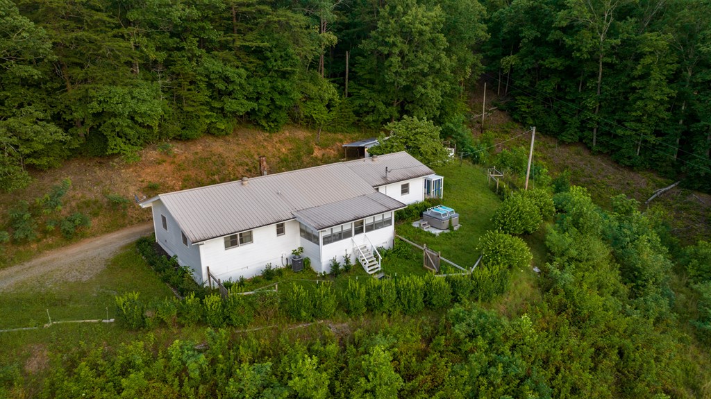 588 Pinetree Road Blue Ridge, GA 30513 - Photo 26 of 54 an aerial view of a house with pool yard and outdoor seating