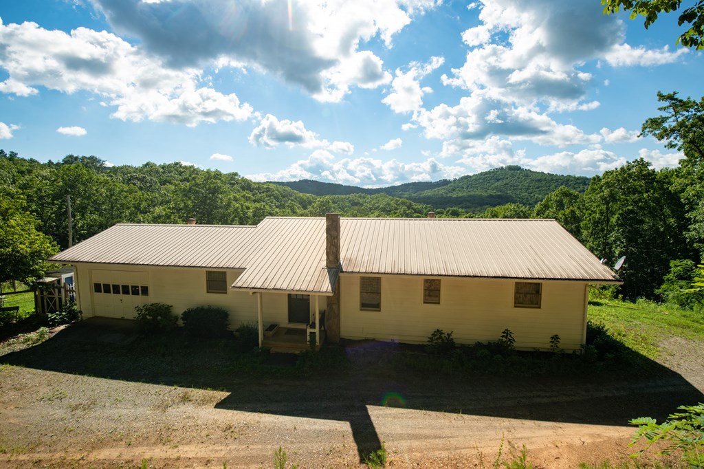 588 Pinetree Road Blue Ridge, GA 30513 - Photo 37 of 54 a aerial view of a house with a yard