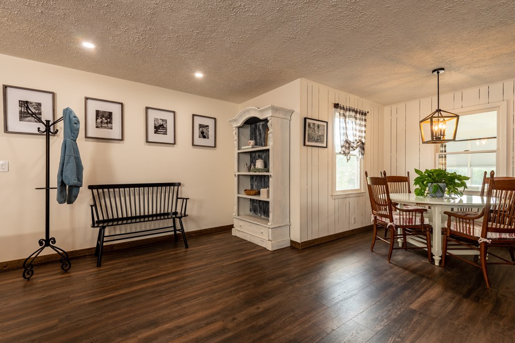 588 Pinetree Road Blue Ridge, GA 30513 - Photo 10 of 54 a view of a livingroom with furniture and hardwood floor