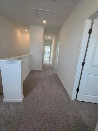 a view of hallway with stairs