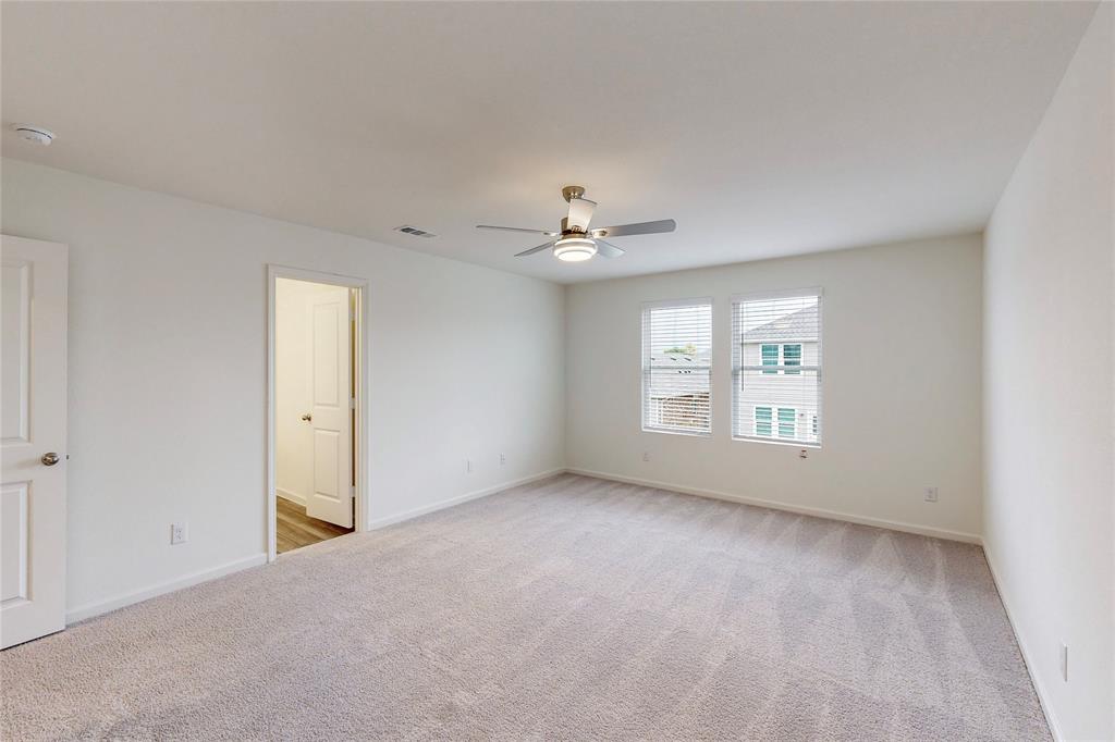 417 Madison Way Princeton, TX 75407 - Photo 15 of 40 Spare room featuring light carpet and ceiling fan