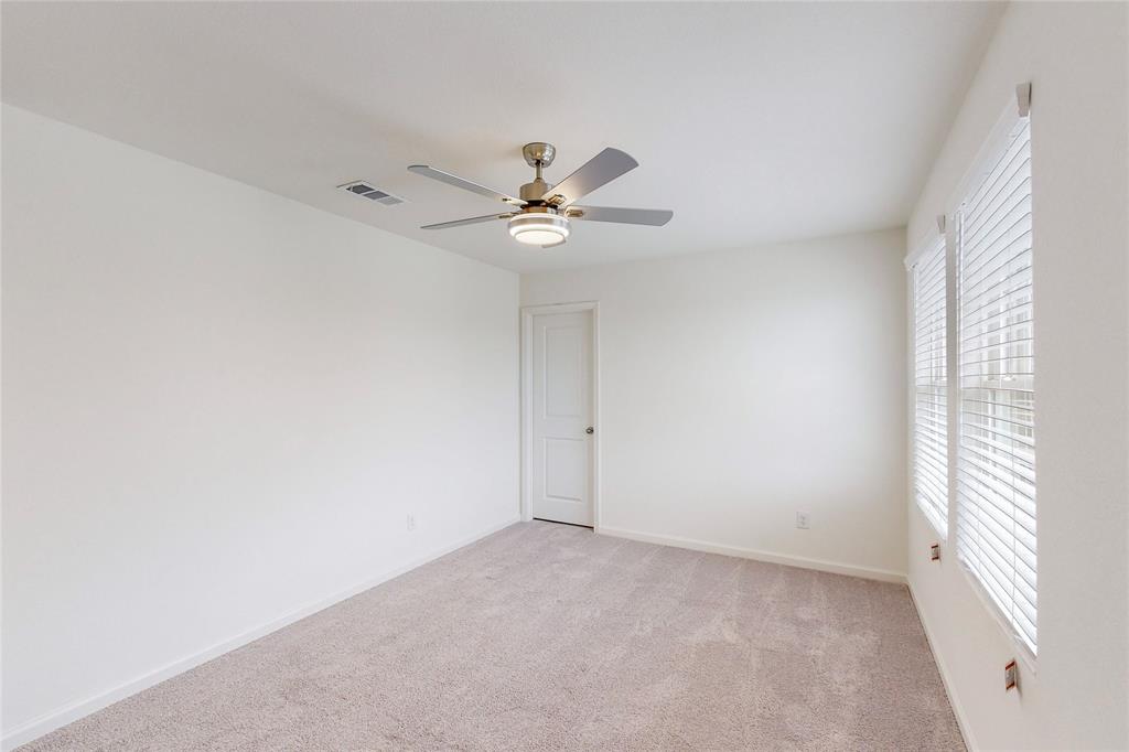 417 Madison Way Princeton, TX 75407 - Photo 28 of 40 Spare room with light carpet and ceiling fan