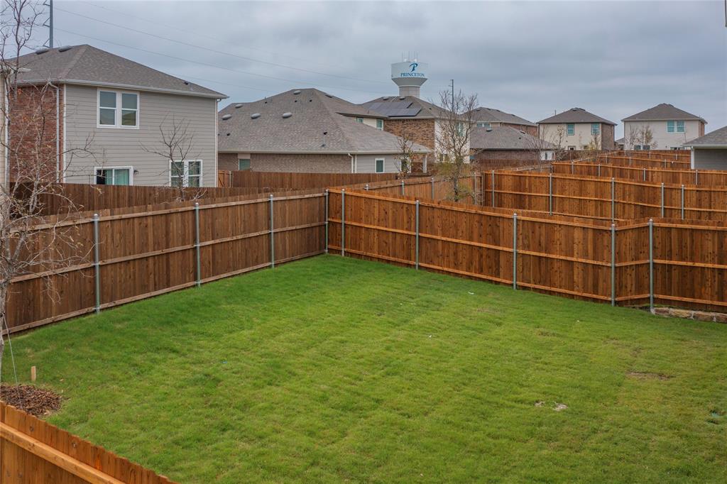 417 Madison Way Princeton, TX 75407 - Photo 38 of 40 Fenced backyard featuring a residential view