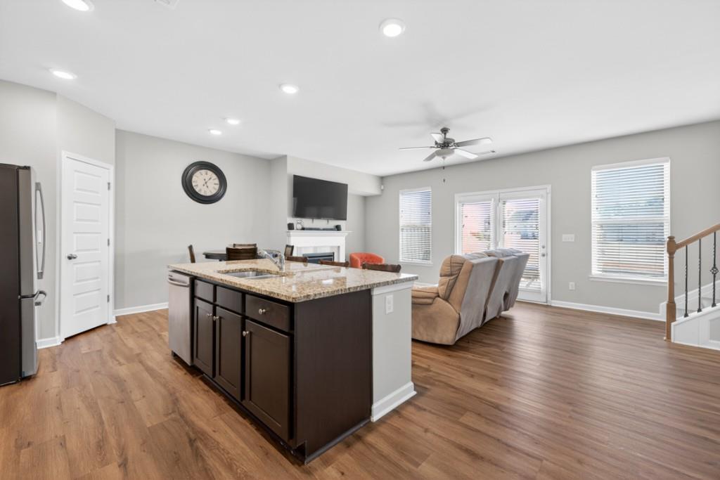 3652 Prospect Point Drive Oakwood, GA 30566 - Photo 2 of 20 a view of kitchen with stainless steel appliances granite countertop a stove and a wooden floors