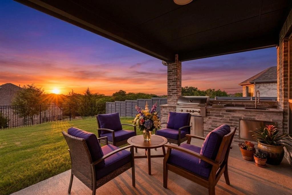 4933 Switchback Street Little Elm, TX 76227 - Photo 19 of 33 Outdoor kitchen for the best backyard entertaining and grilling. The furniture is virtually staged.