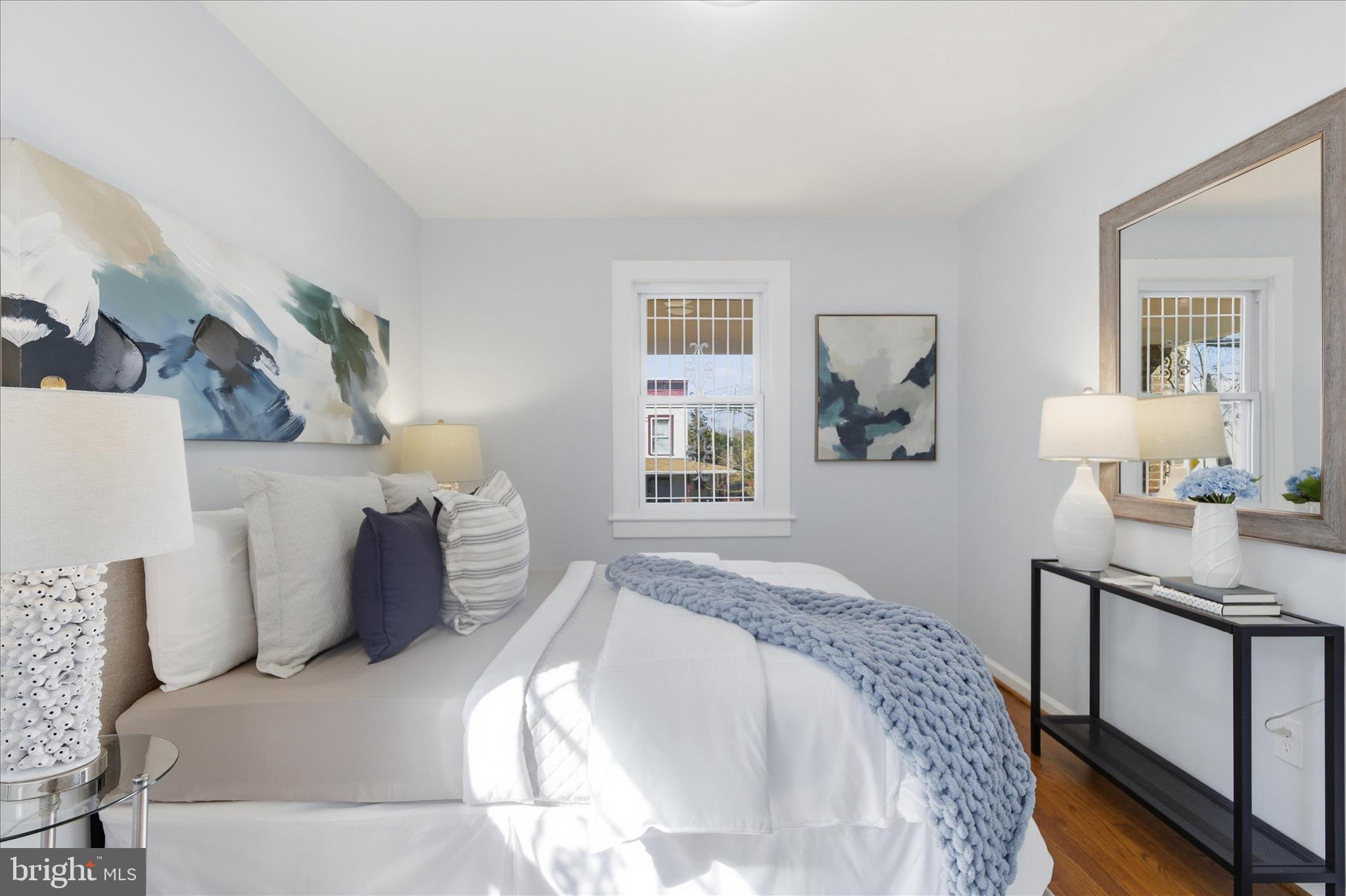 4029 Gault Place Northeast Washington, DC 20019 - Photo 12 of 33 a bedroom with a bed and a window